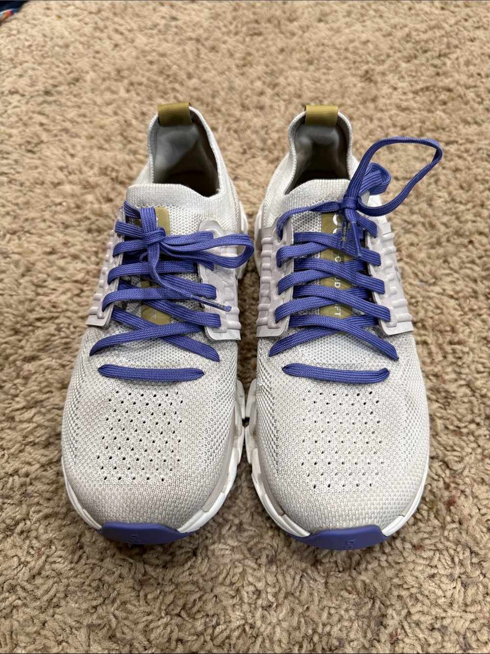 On Running Women's White Athletic Shoes with Purple Laces